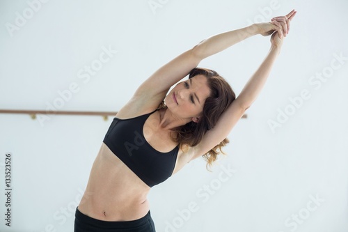 Dancer performing stretching exercise