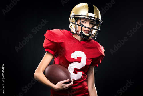 Female american football player in sportswear