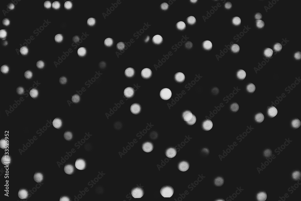 round bokeh lights background, black and white image round bokeh lights background, black and white image