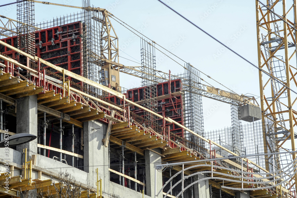 Concrete walls and flats supported by construction poles Concrete walls and flats supported by construction poles