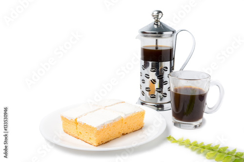 Coconut cream cake with coffee glass on white background photo