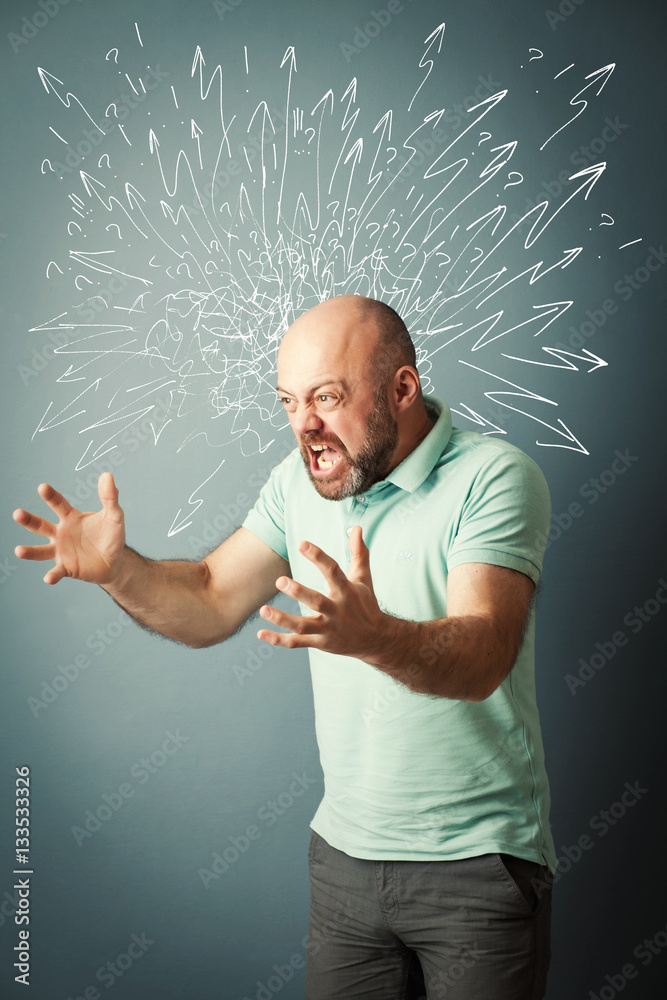 Frustrated desperate bearded middle-aged  man screaming