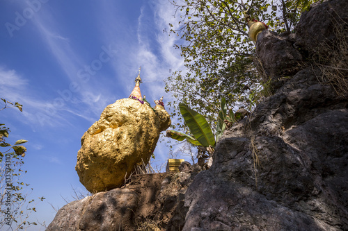 Amazing golden Buddhist pagoda on the cliff "Phra That Hin Kew" Ban Wang Takian, Mae Sot, Thailand