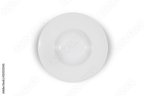 Deep white small soup plate with wide shoulders on white background from above