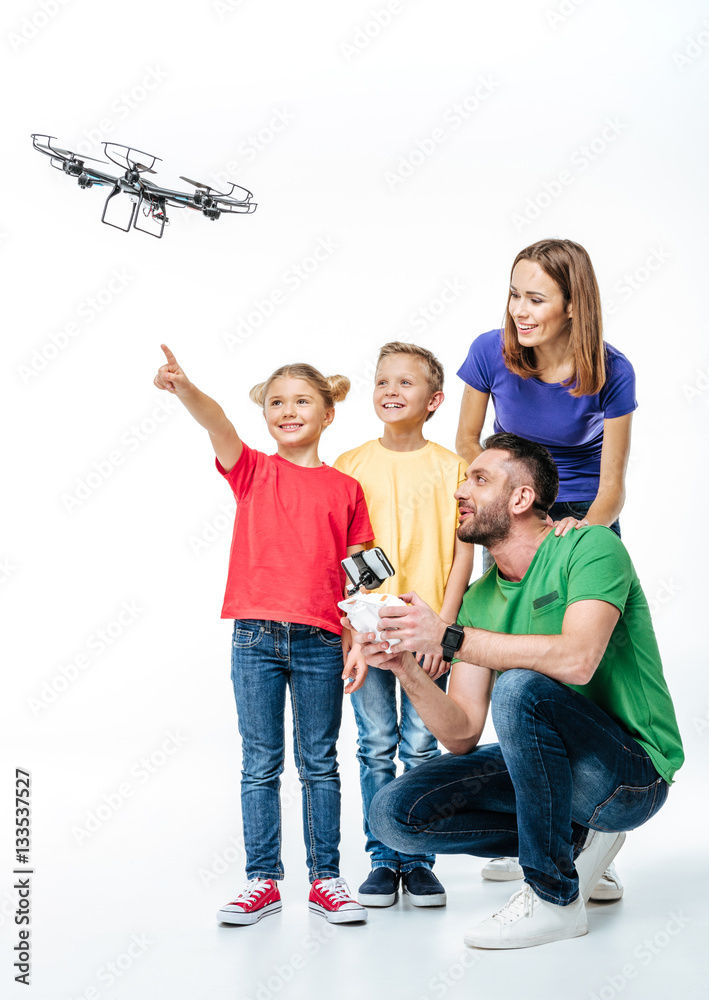 Fototapeta premium Kids using flying hexacopter drone