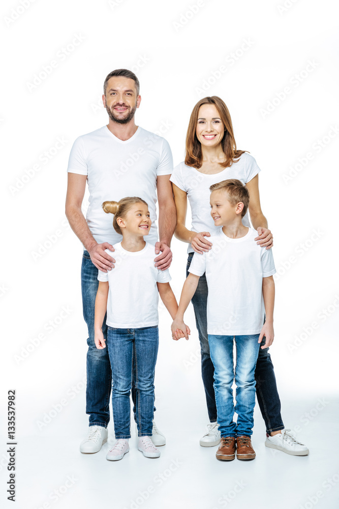 Smiling family in white t-shirts