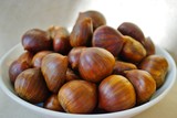 Bowl of fresh Italian chestnuts in the shell in winter