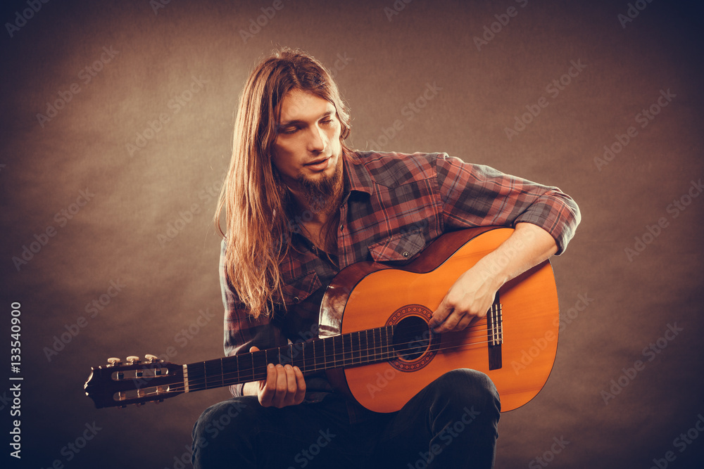 Obraz premium Musican and his instrument