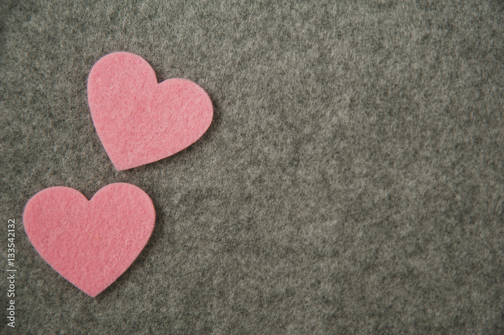 pink hearts on gray felt background. valentine's day pink hearts on gray felt background. valentine's day