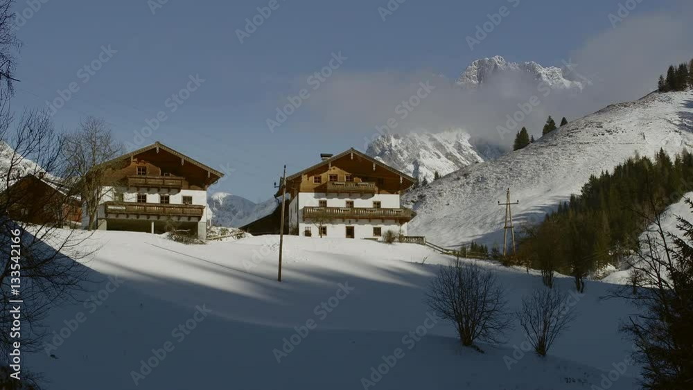 Alpine landscape with the Hochkönig, and some Houses, Alps, Dienten, Salzburger Land, Austria, Europe, Jan 2017 Alpine landscape with the Hochkönig, and some Houses, Alps, Dienten, Salzburger Land, Austria, Europe, Jan 2017