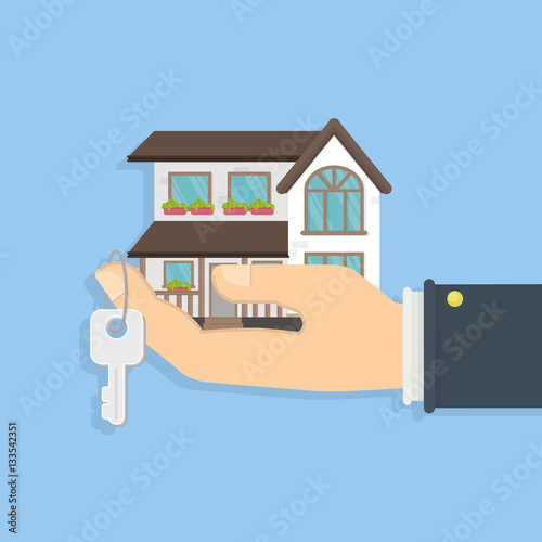 Buying or selling a house. Hand holding keys and a small house. Concept of real estate. Big villa.