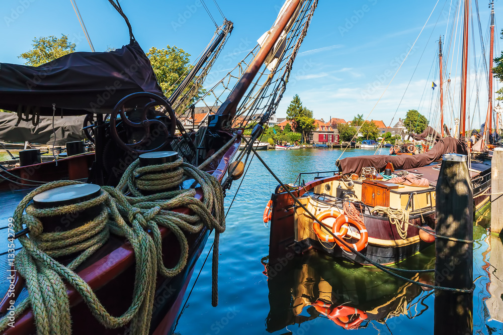 Ancient sailing ships on the Dutch river Vecht