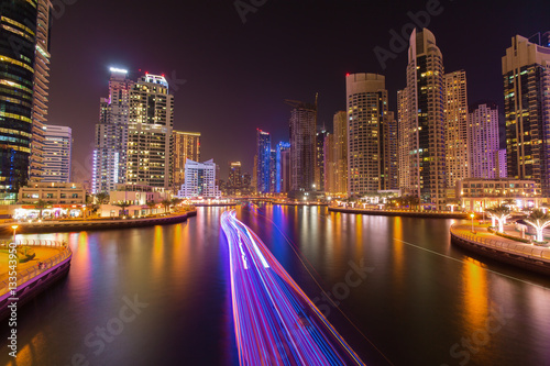 Busy promenade and the bay in Dubai Marina in the evening,Dubai,United Arab Emirates © Rastislav Sedlak SK