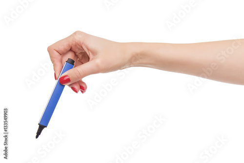 Female hand holds marker.