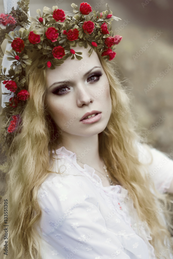 Blond girl without eyebrows with red lips makeup in red dress Blond girl without eyebrows with red lips makeup in red dress