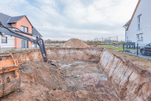 Erdaushub, Hausbau, Tiefbauarbeiten photo