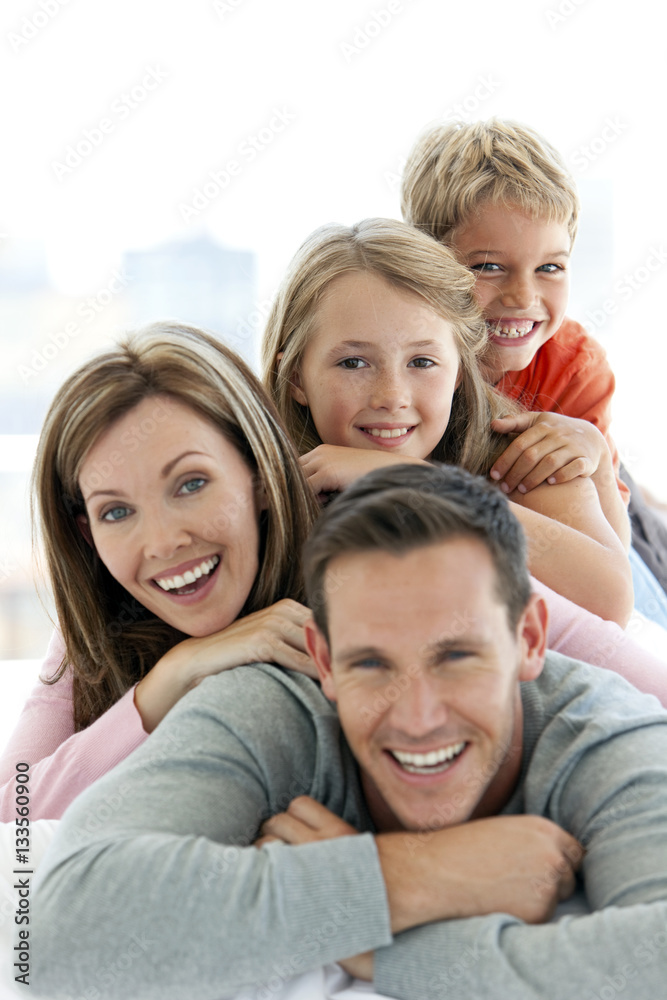 Portrait of a happy Caucasian family with two children