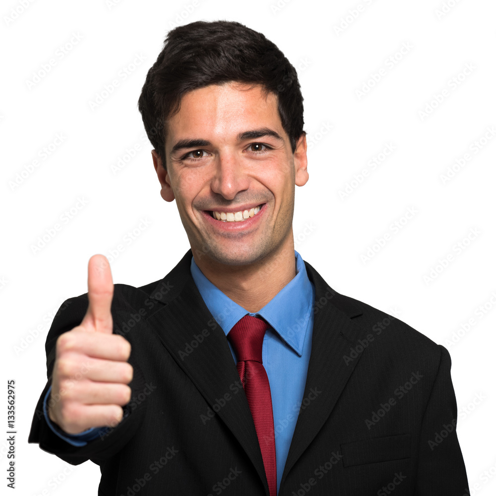 Businessman doing thumbs up sign Businessman doing thumbs up sign