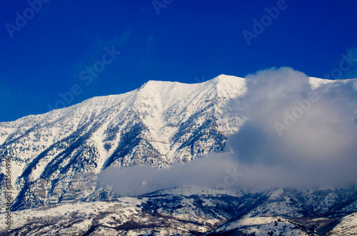 mountains, snow, winter, clouds, fog, blue sky, mountain peak