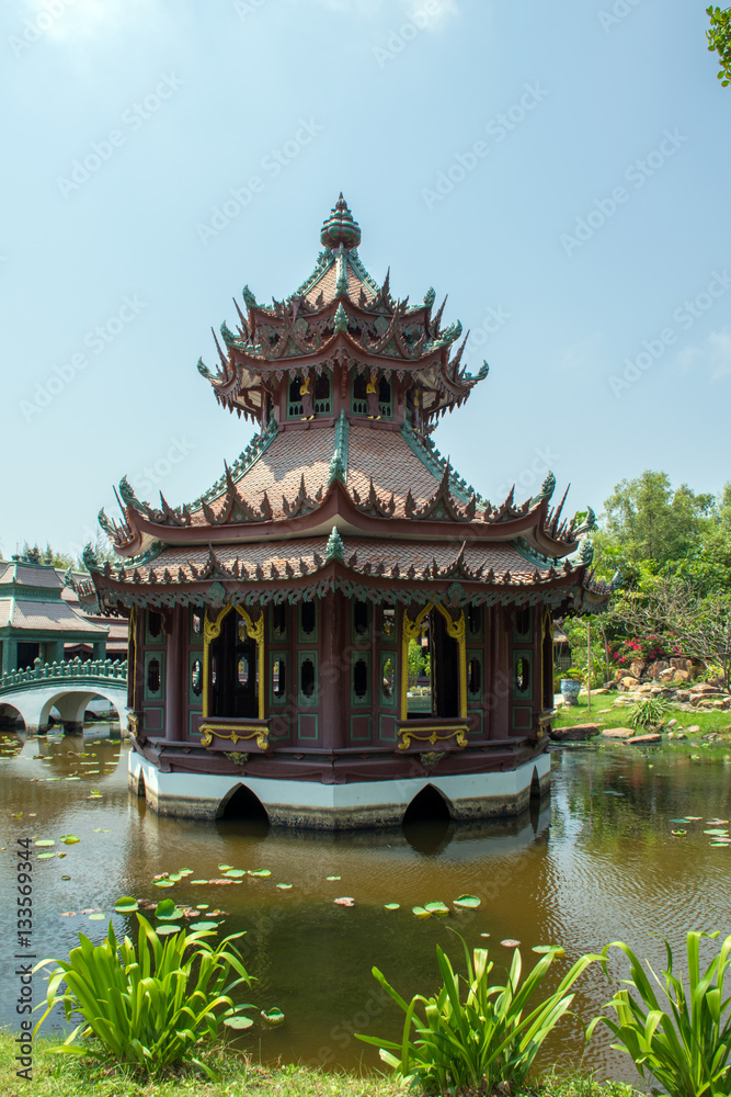 Naklejka premium Architecture of Thailand. Temple in the middle of the lake