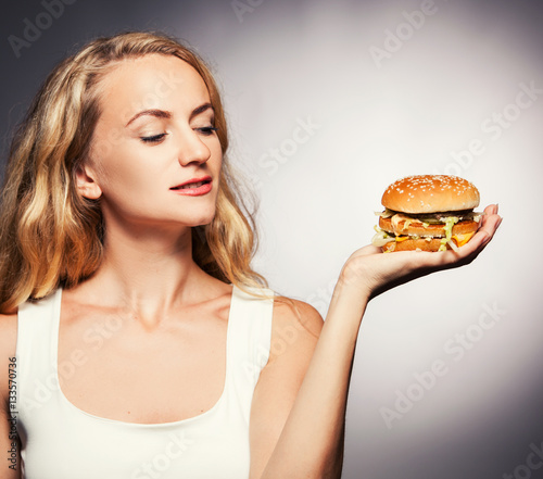 Female with hamburger