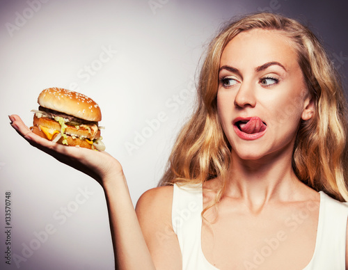 Female with hamburger