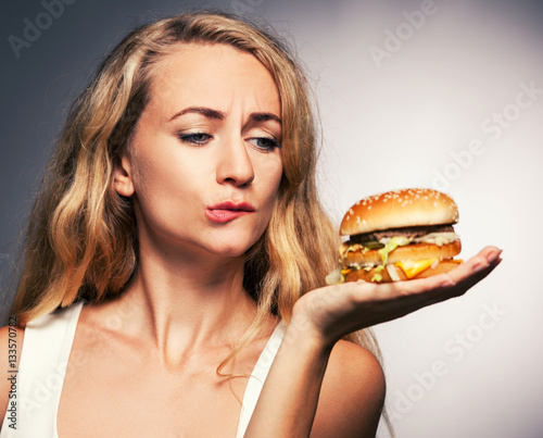 Female with hamburger