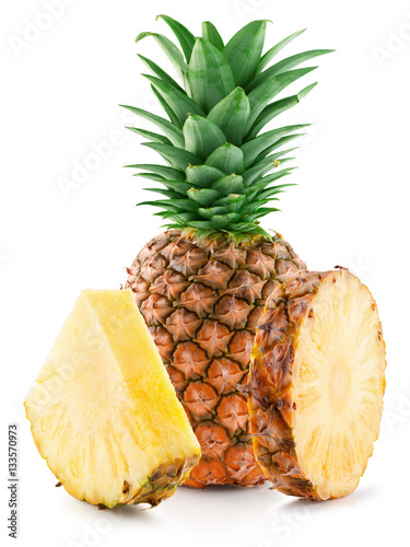 pineapple with slices isolated on the white background