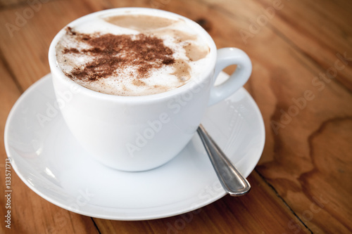 Cappuccino. Mug of coffee with milk foam