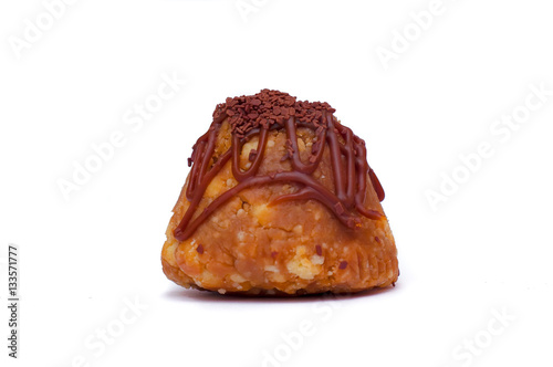 Muffin with chocolate strew isolated on white. Sweet dessert.