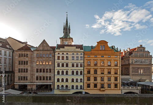 Bedrich Smetana Museum on the bank of Vltava river in old town historical city center, view from Charles Bridge Karluv Most, blue sky white clouds, Bohemia