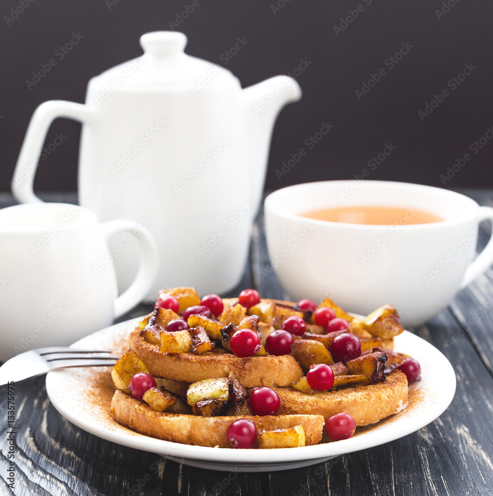 Hot french toasts with caramelized apples, and tea Hot french toasts with caramelized apples, and tea
