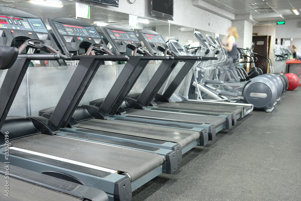 Fototapeta premium image of treadmills in a fitness hall