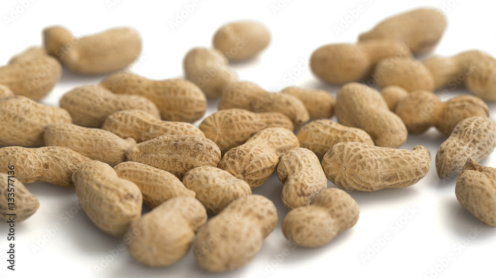 CLOSE UP: Peanuts on white background CLOSE UP: Peanuts on white background