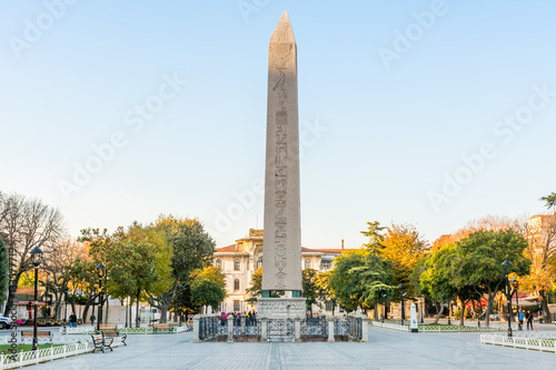 Obelisk of Theodosius (Egyptian Obelisk) near Blue Mosque in the ancient Hippodrome in the morning under golden sunlight in Istanbul, Turkey