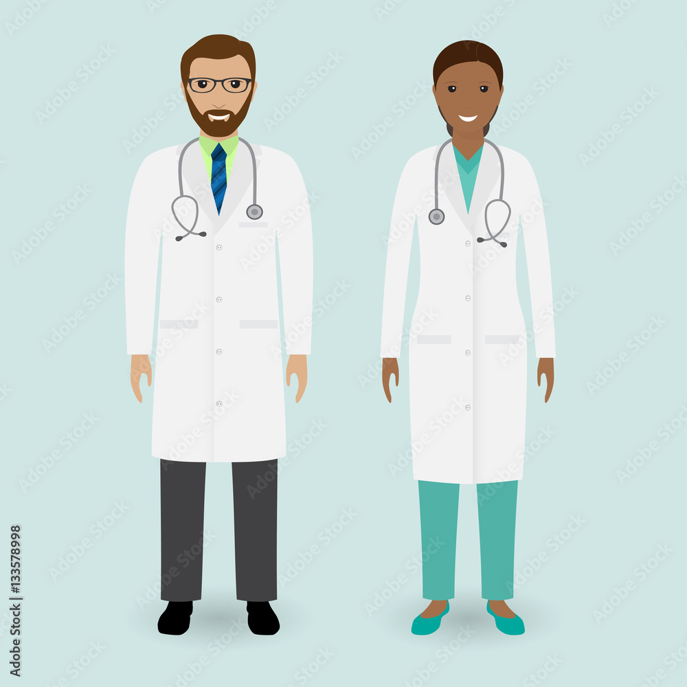 Hospital staff concept. Couple of man and woman doctors standing together.