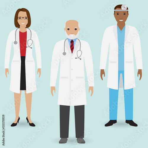 Hospital staff concept. Group of old doctor and young male and female doctors standing together. Medical people.