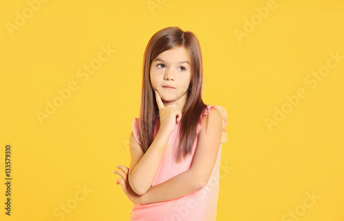 Attractive little girl on y...
