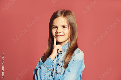 Portrait of cute little gir...