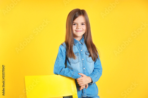 Attractive little girl stan...