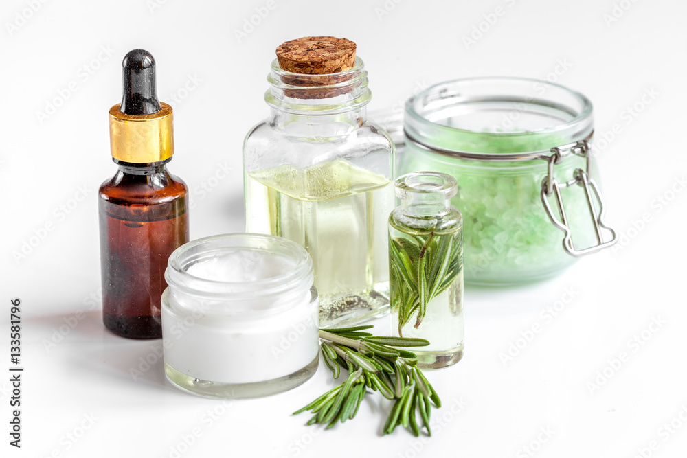 organic cosmetics with extracts of herbs rosemary on white background organic cosmetics with extracts of herbs rosemary on white background