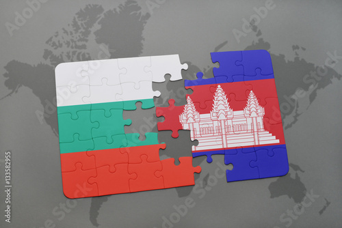 puzzle with the national flag of bulgaria and cambodia on a world map