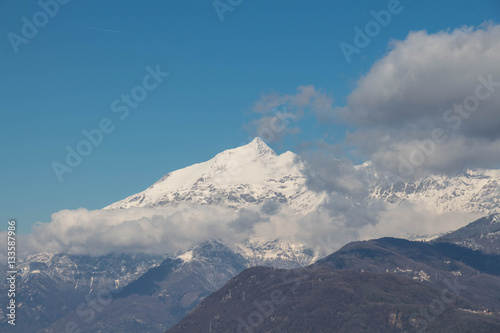Snowy Alps and clouds in Val di Susa. Piedmont. Italy © daisy_y