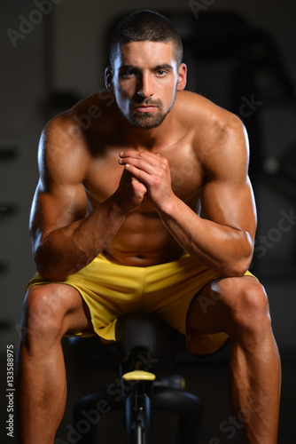 Man Rests In Gym After Having A Workout