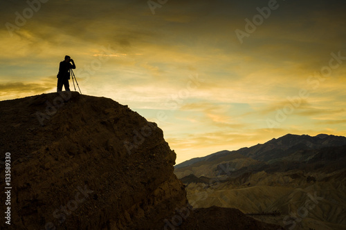 Photographer at Zabriskie Point before sunrise  Death Valley  CA