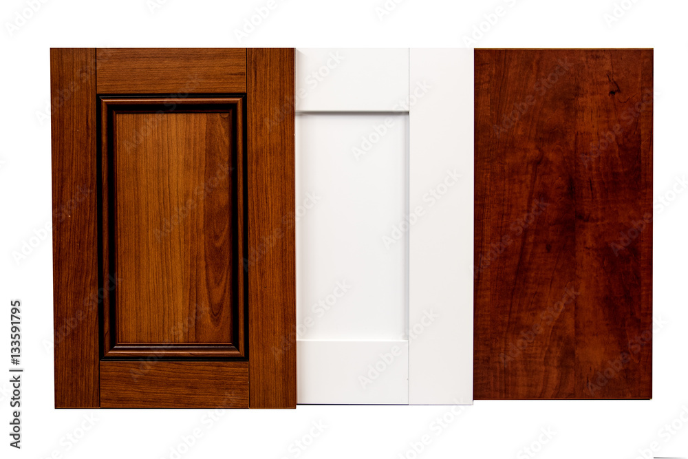 Set of modern wooden kitchen cabinet doors made from maple, mdf and cherry isolated on white background
