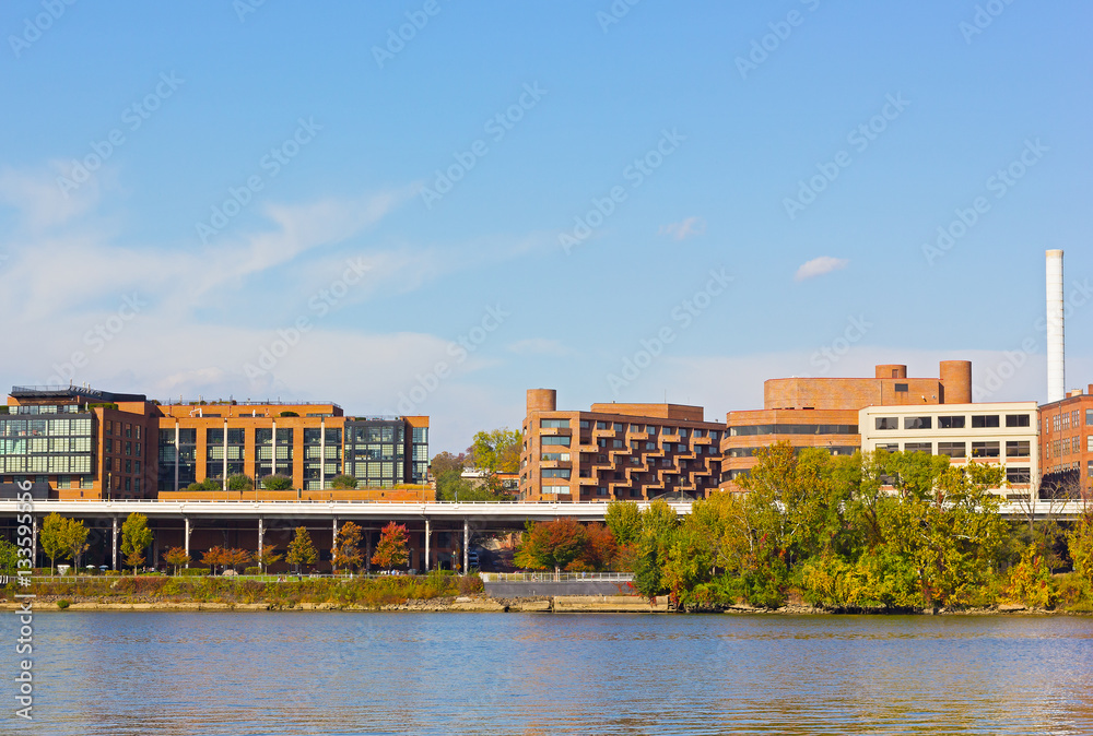 Georgetown waterfront and park Washington DC, USA. Buildings along Potomac River in suburb of US capital.