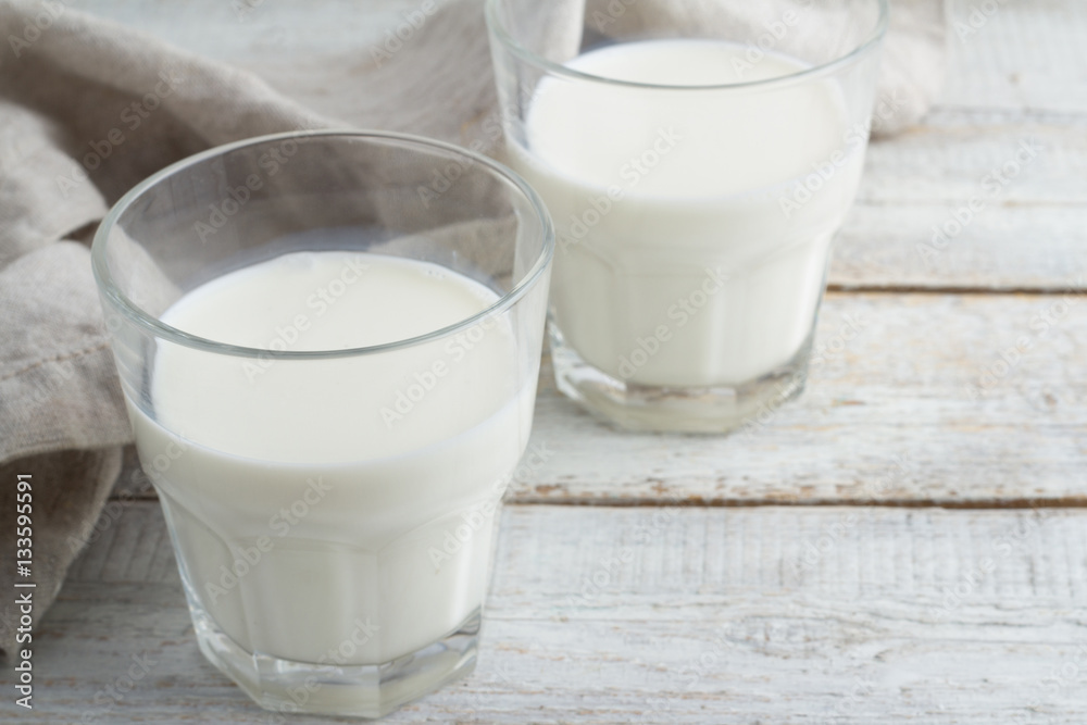 glasses of milk and a towel glasses of milk and a towel