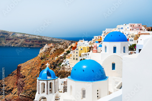 White church with blue domes on Santorini island  Greece