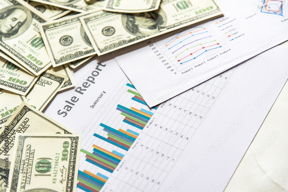 Business concept with money and documents graph, report finance Business concept with money and documents graph, report finance